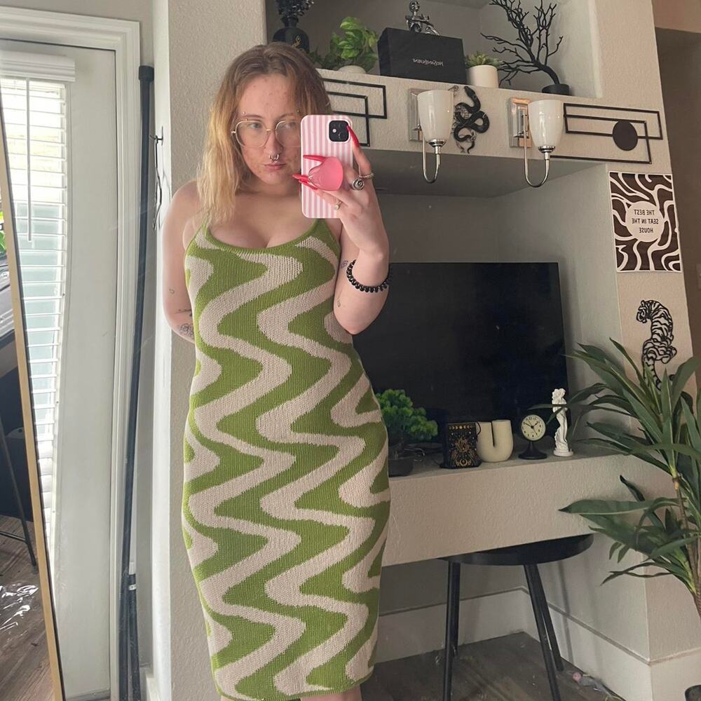 Knit green and white zebra print dress